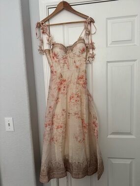Floral linen dress with floral appliqués